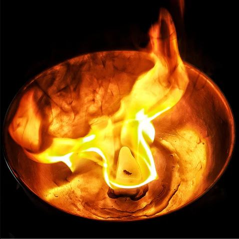Candle in Bowl with big flame
