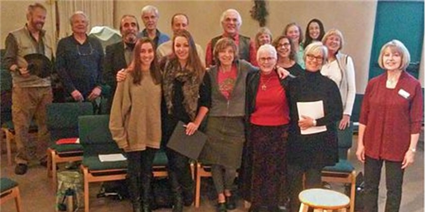 A group of people posing for a photoDescription automatically generated